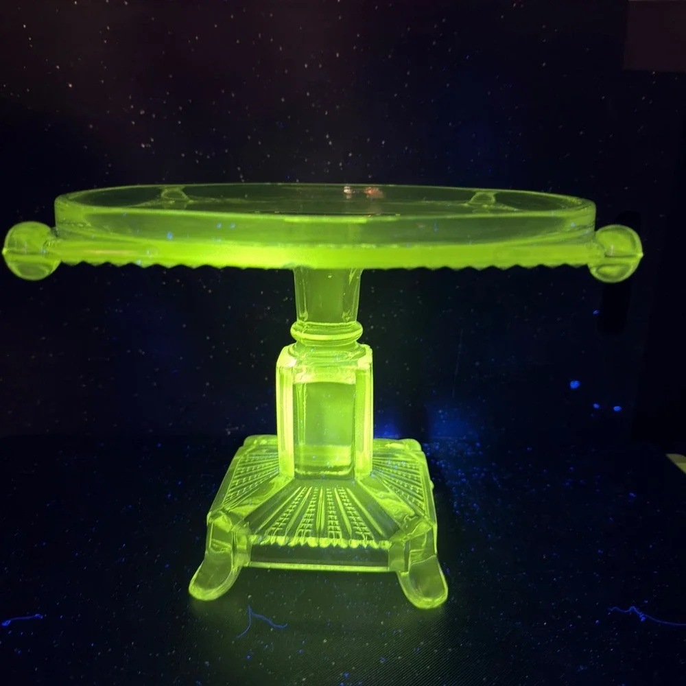 Antique Adams & Co Manganese Glow Glass Cake Stand 8in Tall 10in Wide Clear EAPG
